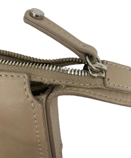 IACUCCI（イアクッチ）IACUCCI (イアクッチ) ショルダーバッグ ベージュの古着・服飾アイテム