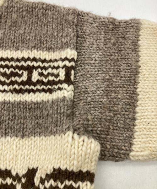 CANADIAN SWEATER COMPANY（カナディアンセーターカンパニー）CANADIAN SWEATER COMPANY (カナディアンセーターカンパニー) サンダーバード柄 カウチンニットカーディガン ベージュ サイズ:不明の古着・服飾アイテム