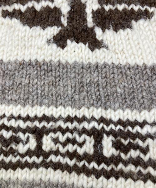 CANADIAN SWEATER COMPANY（カナディアンセーターカンパニー）CANADIAN SWEATER COMPANY (カナディアンセーターカンパニー) サンダーバード柄 カウチンニットカーディガン ベージュ サイズ:不明の古着・服飾アイテム