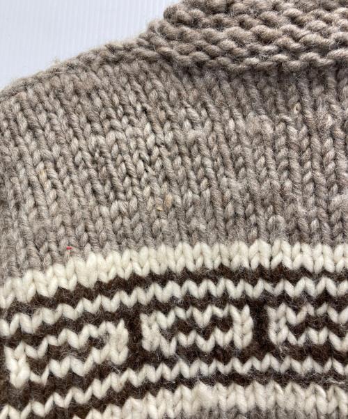 CANADIAN SWEATER COMPANY（カナディアンセーターカンパニー）CANADIAN SWEATER COMPANY (カナディアンセーターカンパニー) サンダーバード柄 カウチンニットカーディガン ベージュ サイズ:不明の古着・服飾アイテム