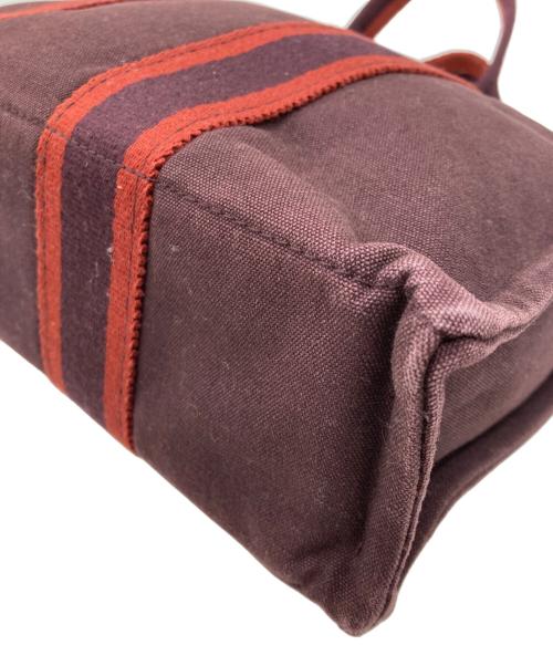 HERMES（エルメス）HERMES (エルメス) キャンバストートバッグ ボルドーの古着・服飾アイテム