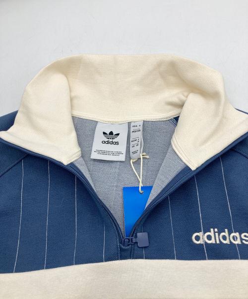 adidas（アディダス）adidas (アディダス) 1/2ジップ トラックトップ プリラブドインク ブルー×ベージュ サイズ:M 未使用品の古着・服飾アイテム