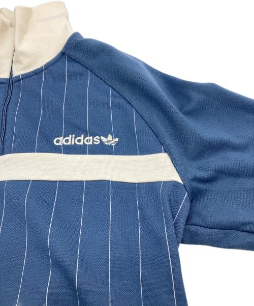 adidas（アディダス）adidas (アディダス) 1/2ジップ トラックトップ プリラブドインク ブルー×ベージュ サイズ:M 未使用品の古着・服飾アイテム