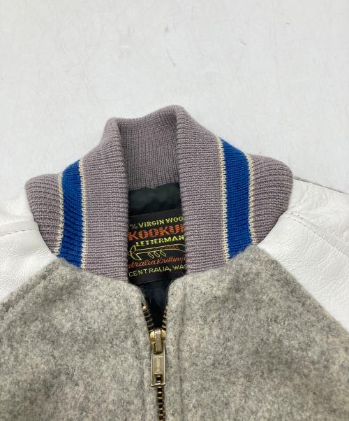 skookum（スクーカム）skookum (スクーカム) 袖レザースタジャン グレー×ホワイト サイズ:36の古着・服飾アイテム