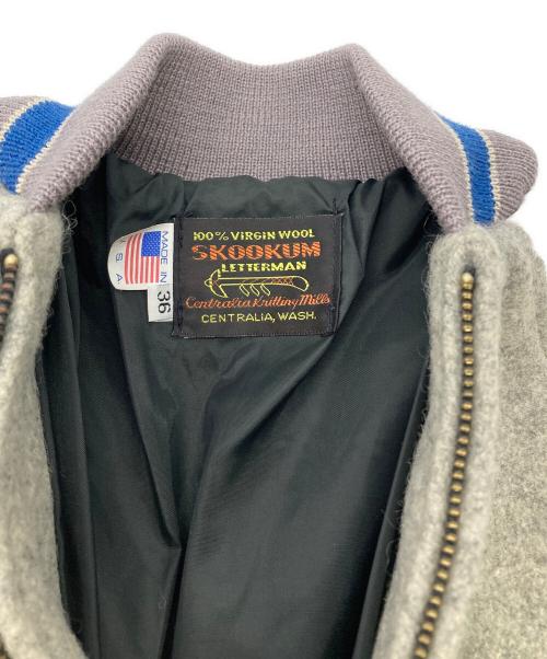 skookum（スクーカム）skookum (スクーカム) 袖レザースタジャン グレー×ホワイト サイズ:36の古着・服飾アイテム