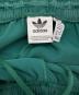 中古・古着 adidas (アディダス) アディカラー サテン ワイドレッグ トラックパンツ グリーン サイズ:XL：6000円