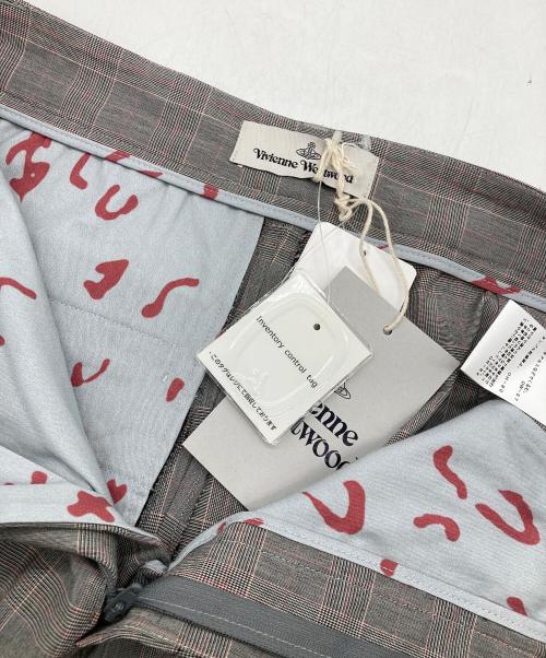 Vivienne Westwood（ヴィヴィアンウエストウッド）Vivienne Westwood (ヴィヴィアンウエストウッド) Ray フレアチェックトラウザー グレー サイズ:40の古着・服飾アイテム