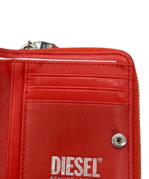 DIESEL（ディーゼル）DIESEL (ディーゼル) コンパクトラウンドファスナー財布 レッドの古着・服飾アイテム