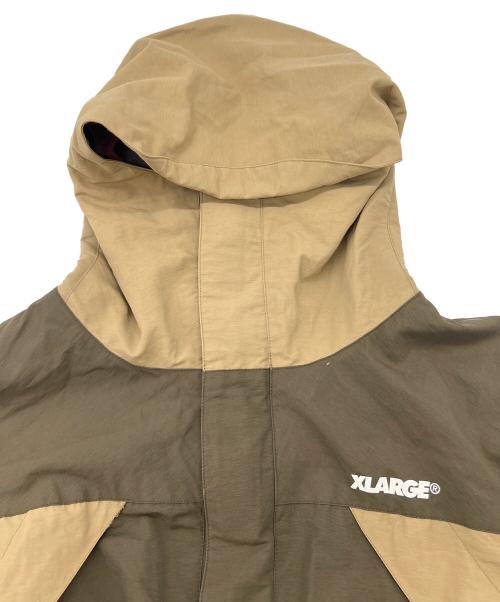 X-LARGE（エクストララージ）X-LARGE (エクストララージ) WILD THINGS (ワイルドシングス) コラボマウンテンパーカー ベージュ サイズ:XLの古着・服飾アイテム