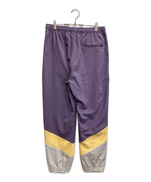 NEW BALANCE（ニューバランス）NEW BALANCE (ニューバランス) タスランナイロンウーブンジョガーパンツ パープル サイズ:Lの古着・服飾アイテム