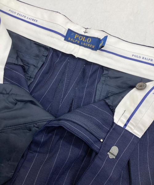 POLO RALPH LAUREN（ポロ・ラルフローレン）POLO RALPH LAUREN (ポロ・ラルフローレン) センタープレスストライプパンツ ネイビーの古着・服飾アイテム