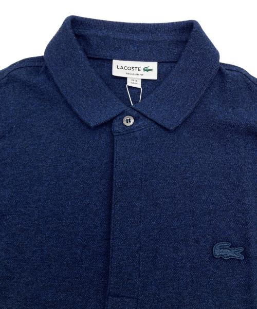 LACOSTE（ラコステ）LACOSTE (ラコステ) 比翼フロントロングスリーブポロシャツ ネイビー サイズ:size4 未使用品の古着・服飾アイテム