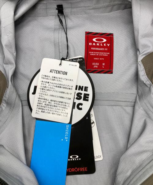 OAKLEY（オークリー）OAKLEY (オークリー) Rs Shell Glaze Shell Jacket 2.0 グレー サイズ:M 未使用品の古着・服飾アイテム