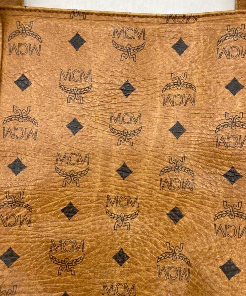 MCM（エムシーエム）MCM (エムシーエム) モノグラム 柄 トートバッグ ブラウンの古着・服飾アイテム