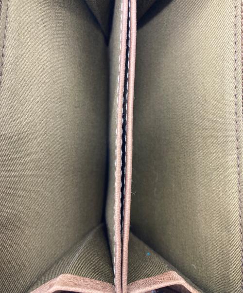 corbo（コルボ）CORBO (コルボ) Curious 縦型折財布 L字ファスナーコインケース付の古着・服飾アイテム