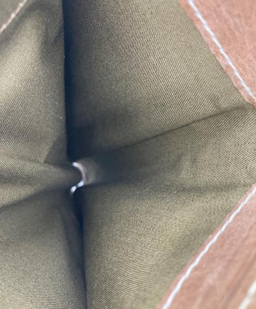 corbo（コルボ）CORBO (コルボ) Curious 縦型折財布 L字ファスナーコインケース付の古着・服飾アイテム