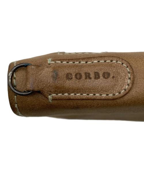corbo（コルボ）CORBO (コルボ) Curious 縦型折財布 L字ファスナーコインケース付の古着・服飾アイテム