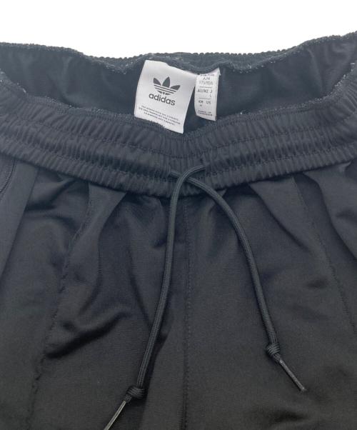 adidas（アディダス）adidas (アディダス) トラックパンツ（ジェンダーニュートラル） ブラック×パープル サイズ:Lの古着・服飾アイテム