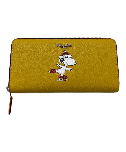 COACH（コーチ）COACH (コーチ) PEANUTS (ピーナッツ) 長財布 イエローの古着・服飾アイテム