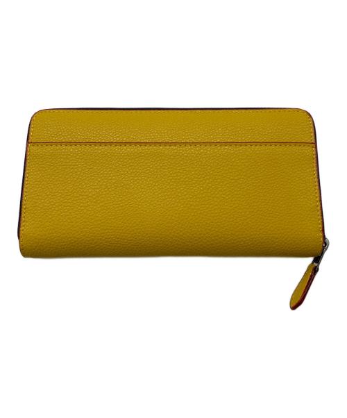 COACH（コーチ）COACH (コーチ) PEANUTS (ピーナッツ) 長財布 イエローの古着・服飾アイテム