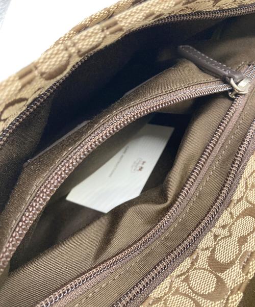 COACH（コーチ）COACH (コーチ) シグネチャーメッセンジャーバッグ ベージュの古着・服飾アイテム
