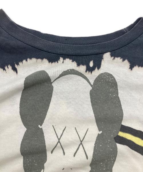 cactus jack（カクタス・ジャック）cactus jack (カクタス・ジャック) KAWS (カウズ) FRAGMENT コラボ ロンT ホワイト×ネイビー サイズ:XLの古着・服飾アイテム
