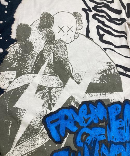 cactus jack（カクタス・ジャック）cactus jack (カクタス・ジャック) KAWS (カウズ) FRAGMENT コラボ ロンT ホワイト×ネイビー サイズ:XLの古着・服飾アイテム
