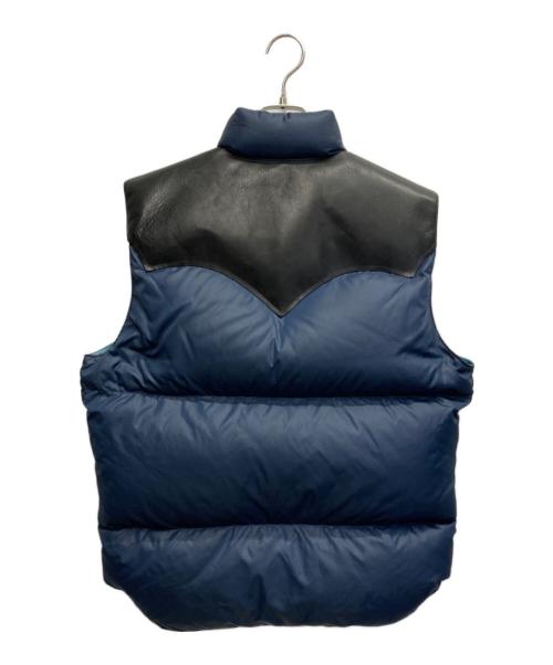 RockyMountainFeatherBed（ロッキーマウンテンフェザーベッド）RockyMountainFeatherBed (ロッキーマウンテンフェザーベッド) WAREHOUSE (ウエアハウス) RIP STOP NYLON DOWN VEST ネイビー×ブラック サイズ:42の古着・服飾アイテム
