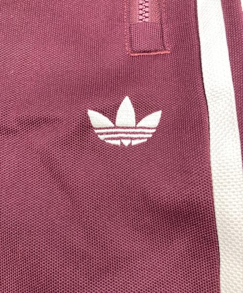 adidas（アディダス）adidas (アディダス) Sporty & Rich (スポーティーアンドリッチ) TRACKPANT マルーン ボルドー サイズ:XLの古着・服飾アイテム