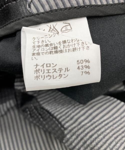 ISSEY MIYAKE（イッセイミヤケ）ISSEY MIYAKE (イッセイミヤケ) ヘリンボーンプリーツパンツ グレー×ブラック サイズ:3の古着・服飾アイテム