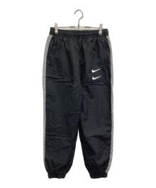 NIKE（ナイキ）の古着「Swoosh Woven Pant」｜ブラック