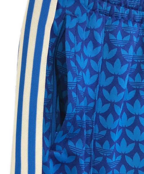 adidas（アディダス）adidas (アディダス) モノグラムトラックパンツ ブルー サイズ:SIZE　Mの古着・服飾アイテム