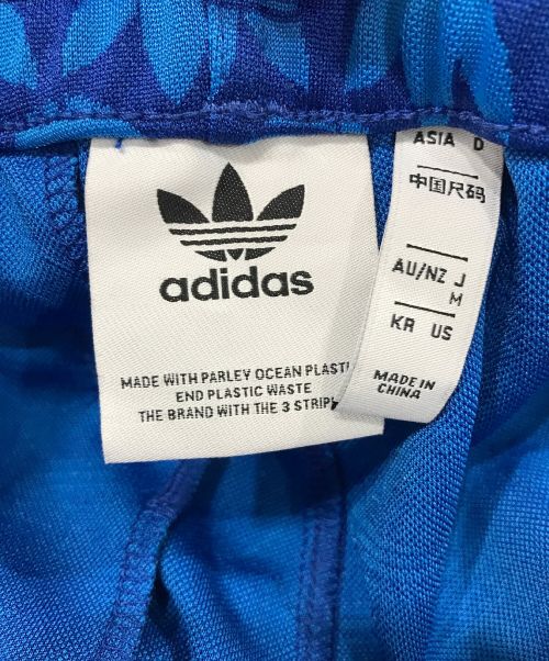 adidas（アディダス）adidas (アディダス) モノグラムトラックパンツ ブルー サイズ:SIZE　Mの古着・服飾アイテム