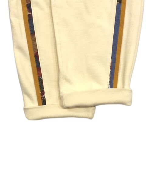 RehersalL（リハーズオール）RehersalL (リハーズオール) vintage print track pants ivory ベージュ サイズ:Sの古着・服飾アイテム
