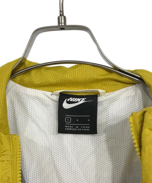 NIKE（ナイキ）NIKE (ナイキ) SWOOSH HOODY WOVEN JKT グレー×イエロー サイズ:Lの古着・服飾アイテム