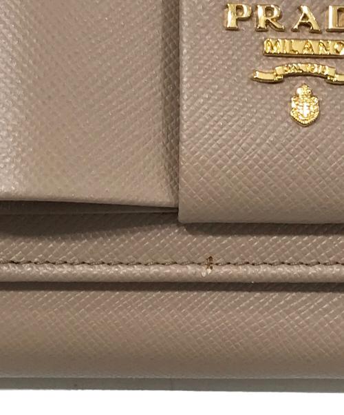 PRADA（プラダ）PRADA (プラダ) SAFFIANO FIOCCO 長財布 CAMMEOの古着・服飾アイテム