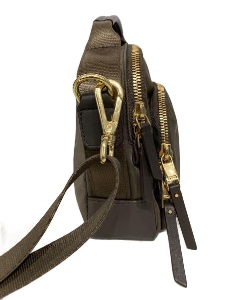 TUMI（トゥミ）TUMI (トゥミ) VOYAGEUR-TROY CROSSBODY ブラウンの古着・服飾アイテム