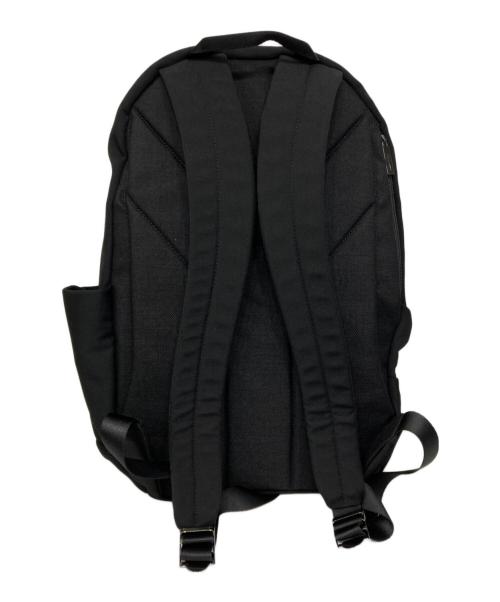 UN METRE（アンメートルプロダクションズ）UN METRE (アンメートルプロダクションズ) Yohji Yamamoto pour homme (ヨウジヤマモト プールオム) WOOL GABARDINE/NYLON TUCK BACKPACK ブラックの古着・服飾アイテム