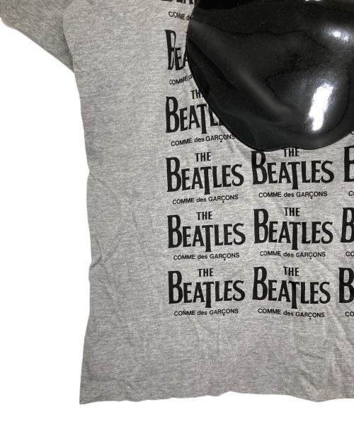 THE BEATLES COMME des GARCONS（ザ・ビートルズコムデギャルソン）THE BEATLES COMME des GARCONS (ザ・ビートルズコムデギャルソン) ラバーアップルTシャツ グレー サイズ:XLの古着・服飾アイテム