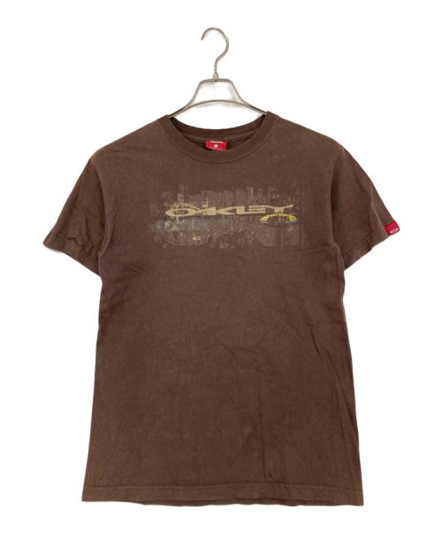 OAKLEY（オークリー）OAKLEY (オークリー) 【古着】90'sプリントTシャツ ブラウン サイズ:Mの古着・服飾アイテム