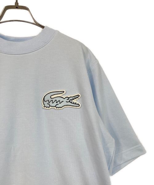 LACOSTE（ラコステ）LACOSTE (ラコステ) オーバーサイズクロックエンブレムスウェットTシャツ ブルー サイズ:SIZE 4の古着・服飾アイテム
