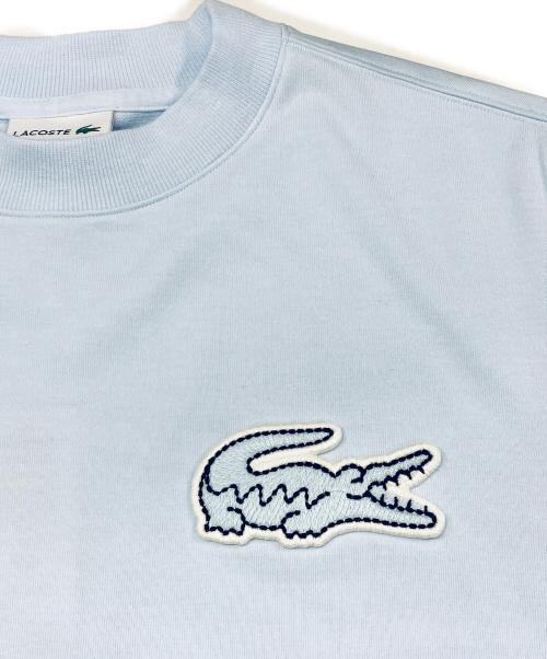 LACOSTE（ラコステ）LACOSTE (ラコステ) オーバーサイズクロックエンブレムスウェットTシャツ ブルー サイズ:SIZE 4の古着・服飾アイテム