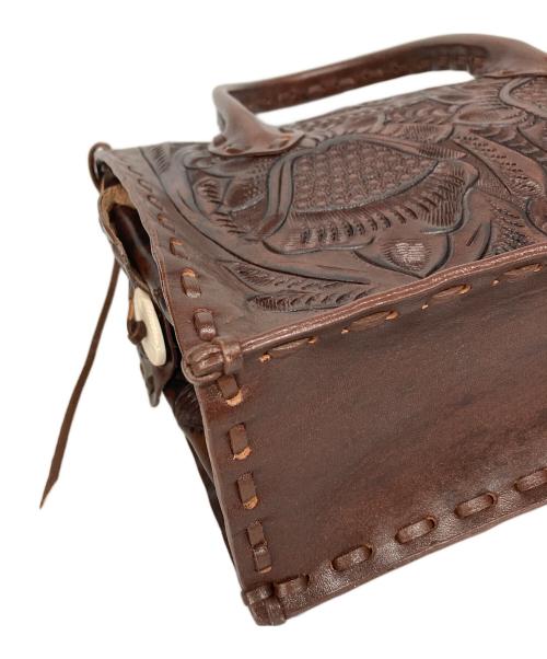 Carving Tribes（カービングトライブス）Carving Tribes (カービングトライブス) カービングバッグ ブラウンの古着・服飾アイテム