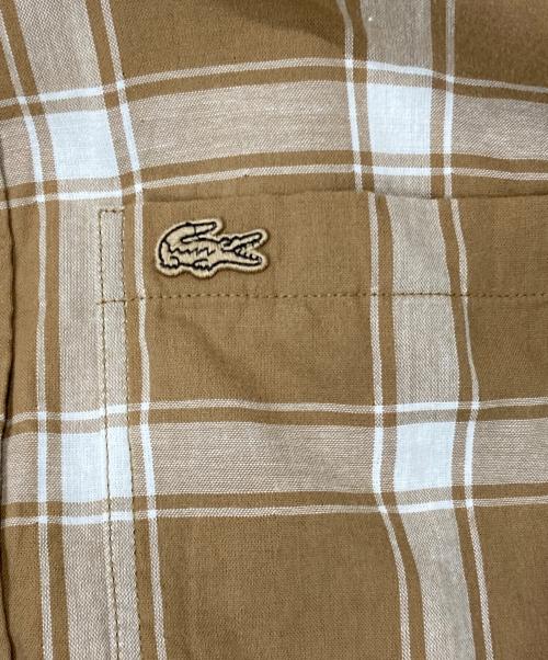 LACOSTE（ラコステ）LACOSTE (ラコステ) リバーシブルスナップボタンシャツ ブラウン×ベージュ サイズ:US Sの古着・服飾アイテム
