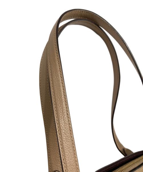 COACH（コーチ）COACH (コーチ) テイタム キャリーオール ベージュの古着・服飾アイテム