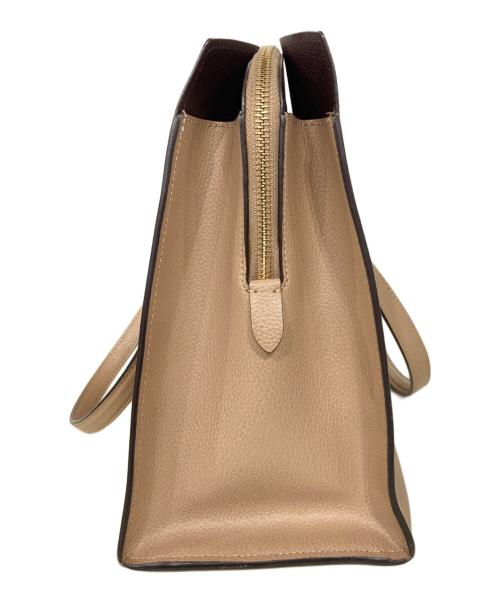 COACH（コーチ）COACH (コーチ) テイタム キャリーオール ベージュの古着・服飾アイテム
