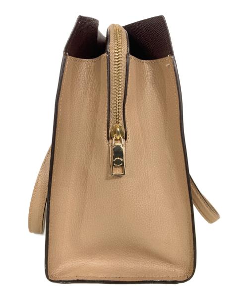 COACH（コーチ）COACH (コーチ) テイタム キャリーオール ベージュの古着・服飾アイテム