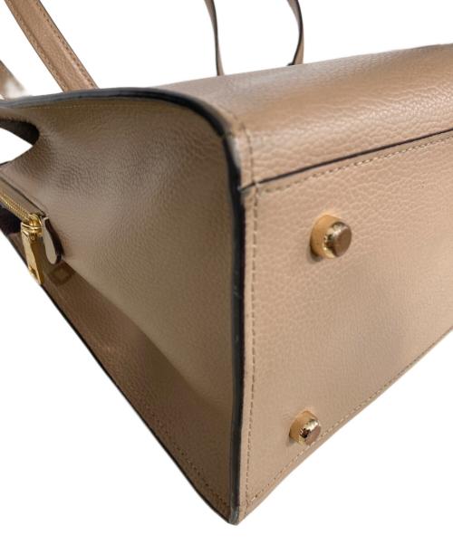 COACH（コーチ）COACH (コーチ) テイタム キャリーオール ベージュの古着・服飾アイテム