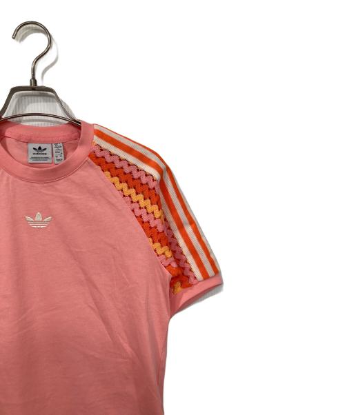 adidas（アディダス）adidas (アディダス) オリジナルス サマーグロー カリ 半袖Tシャツ ピンク サイズ:Mの古着・服飾アイテム