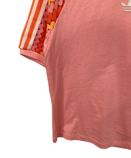 adidas（アディダス）adidas (アディダス) オリジナルス サマーグロー カリ 半袖Tシャツ ピンク サイズ:Mの古着・服飾アイテム